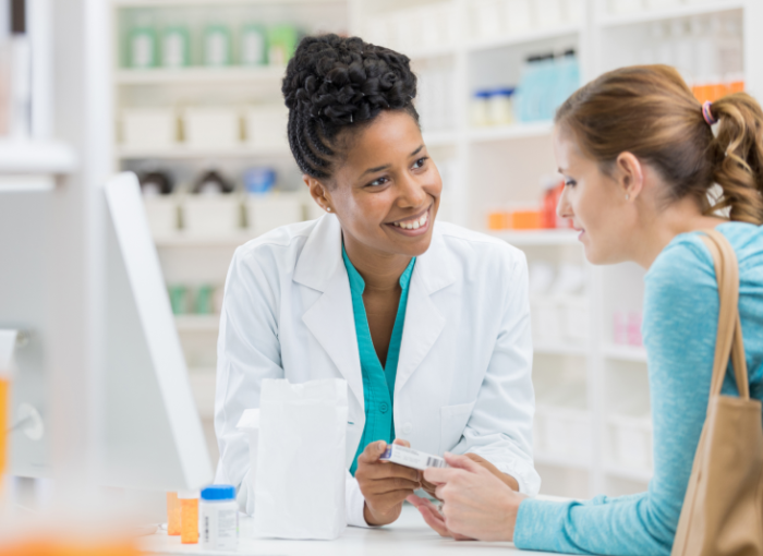 pharmacist helping a woman